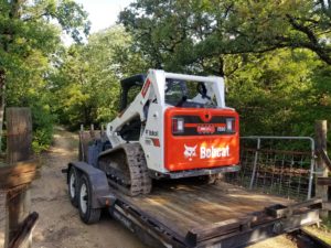 image of bobcat services, land clearing, demolition and excavation services in Austin, Texas by R&M Land clearing, demolition, and excavations