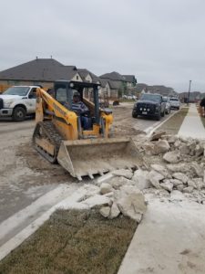image of sidewalk demolition, land clearing, demolition and excavation services in Austin, Texas by R&M Land clearing, demolition, and excavations